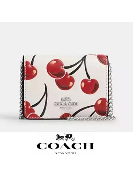 Coach Handbags - Coach Cherry Print Mini Leather Crossbody in White and Red